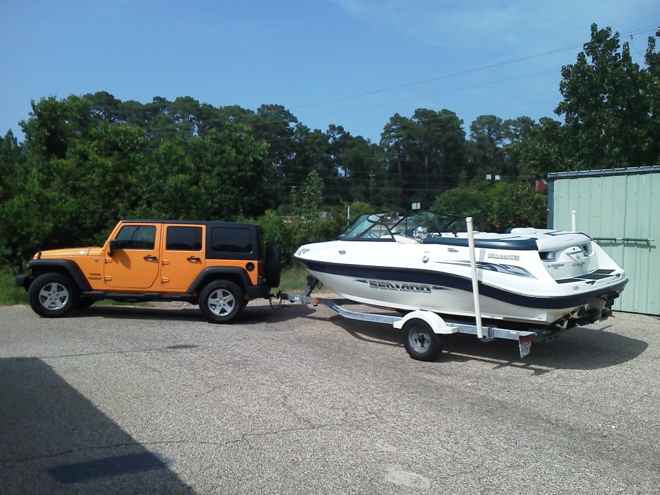 2012 Jeep and 2003 Seadoo Utopia 185