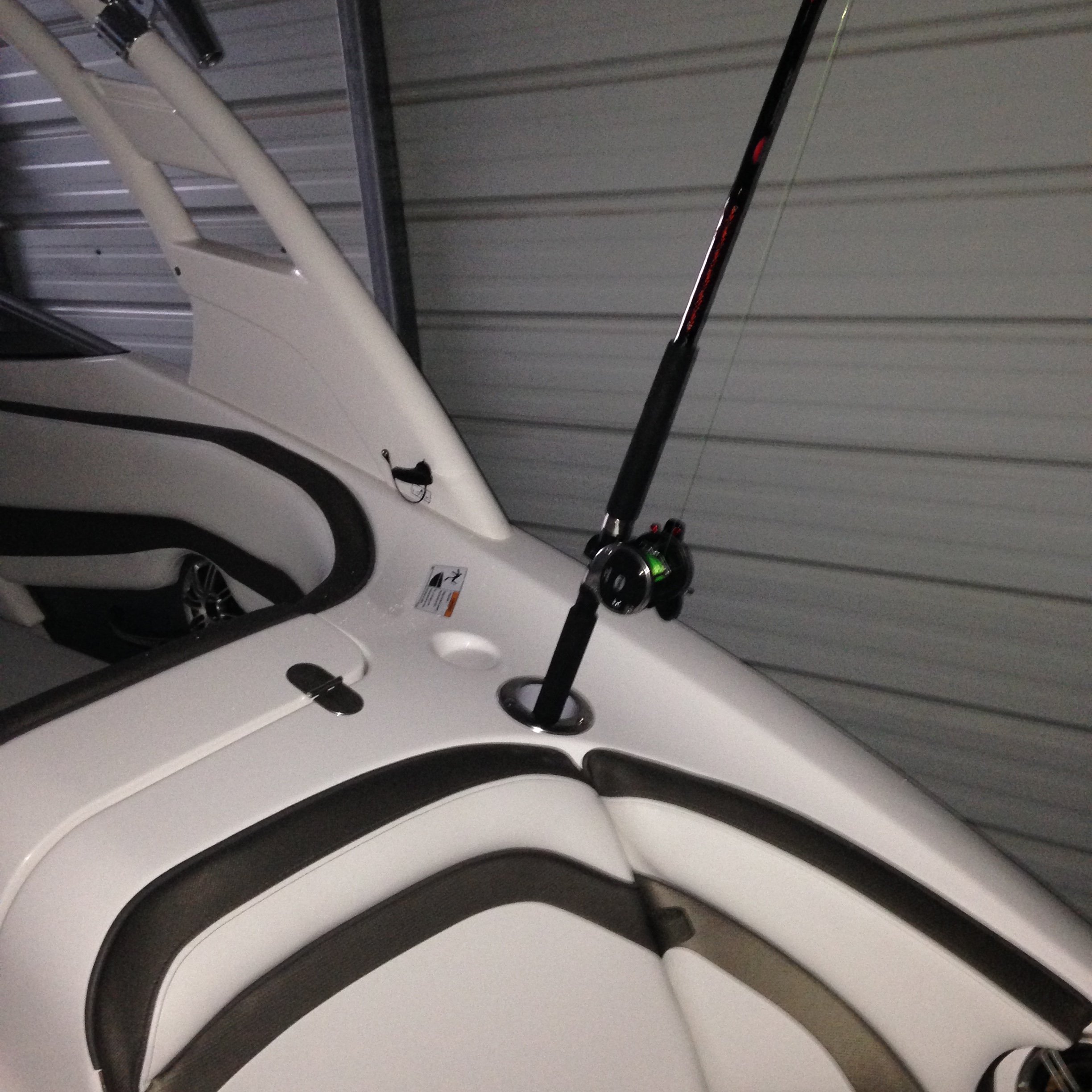 Fishing pole holder and cup holder added